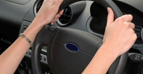 Woman having an intensive driving course